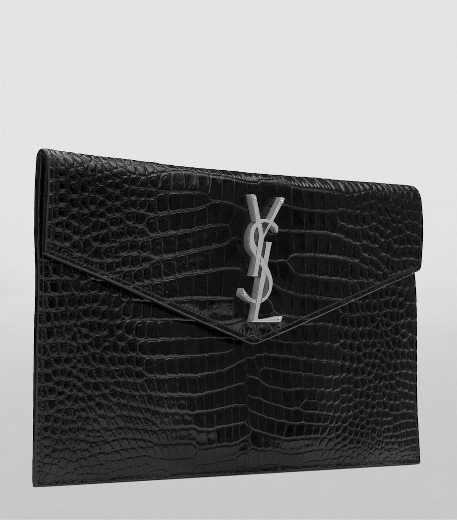 Saint Laurent Uptown croc-embossed leather clutch bag, UK version