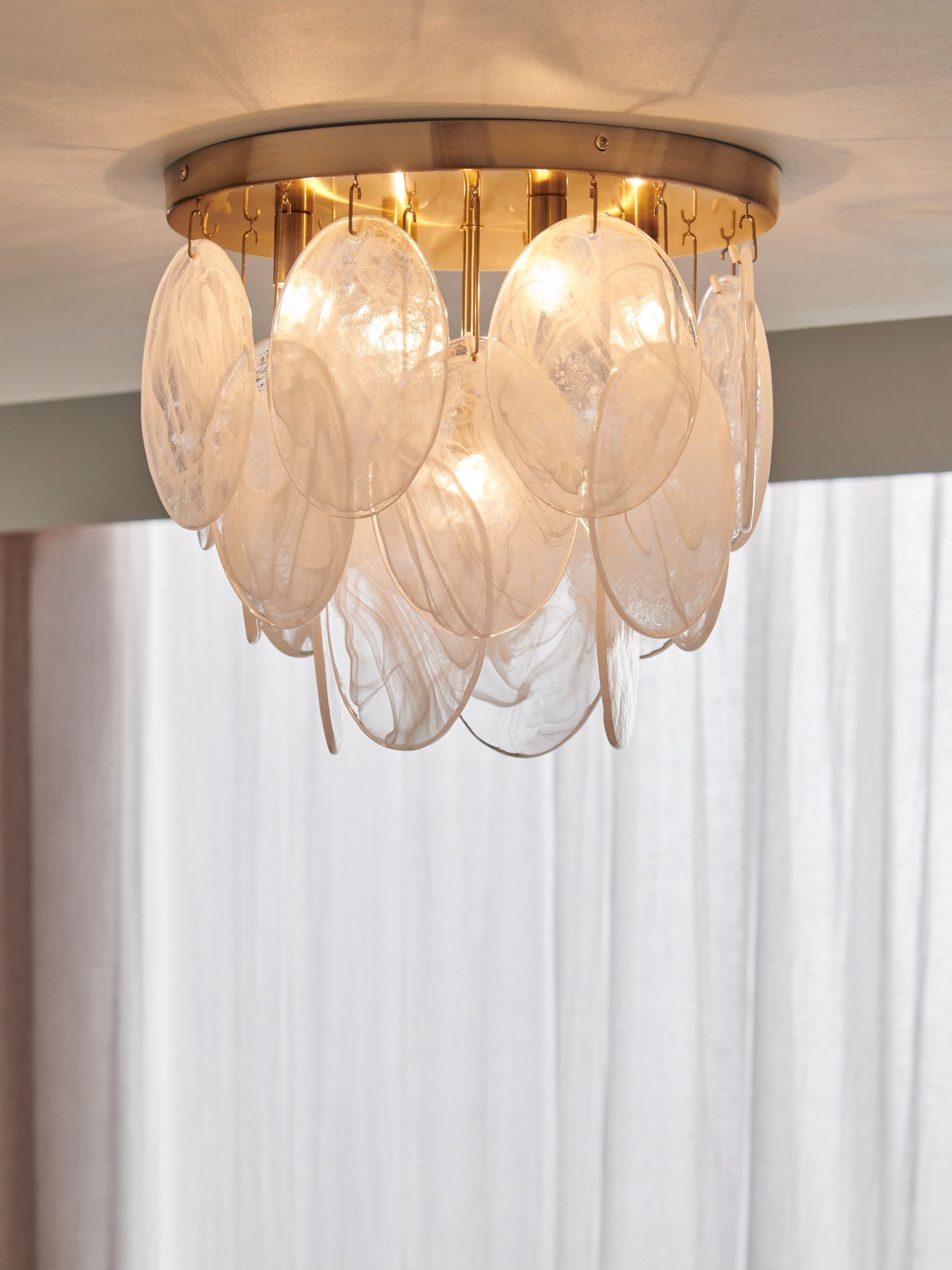 Lipsy marble effect flush ceiling light with gold finish, imported from the UK