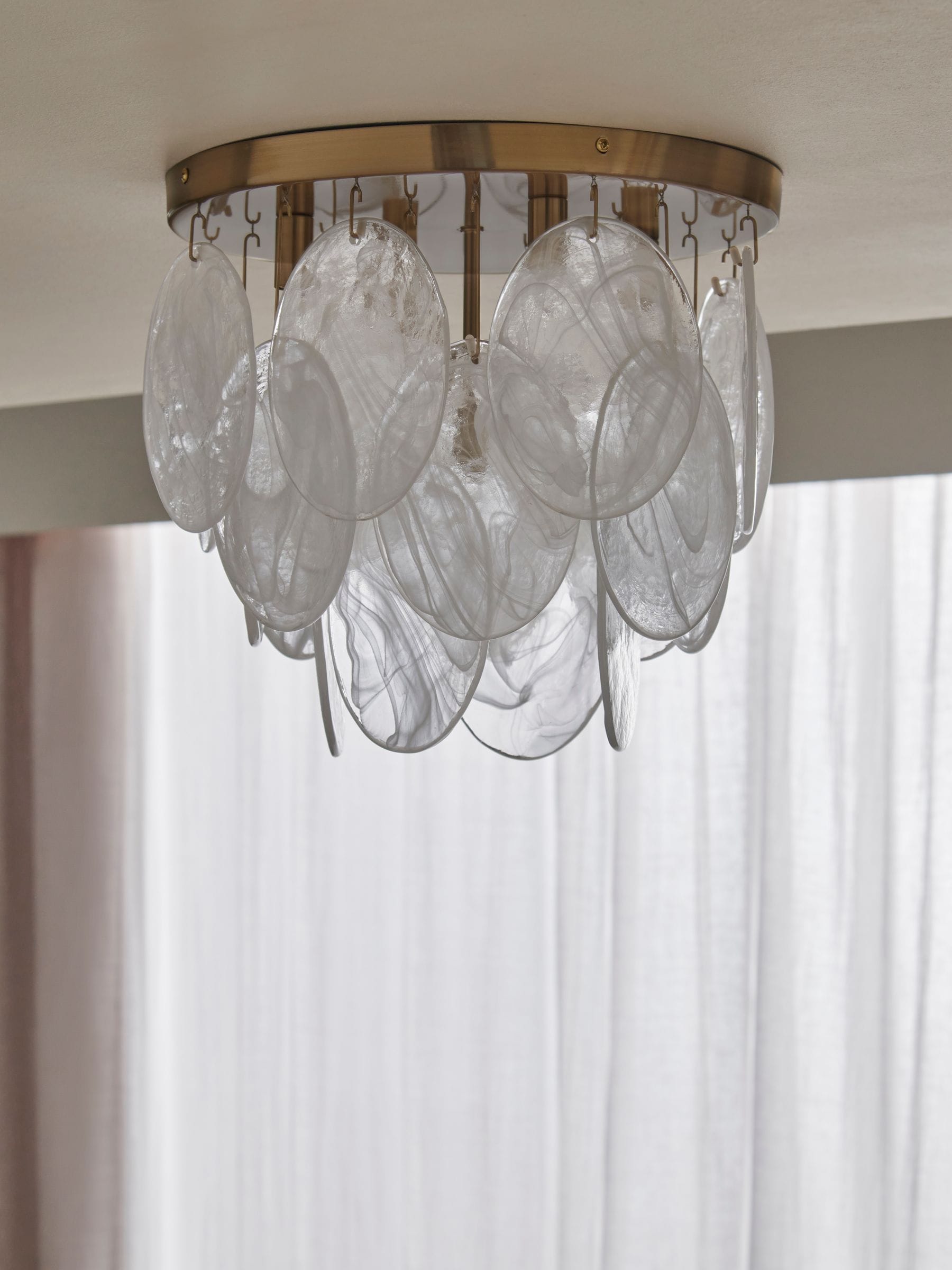Lipsy marble effect flush ceiling light with gold finish, imported from the UK