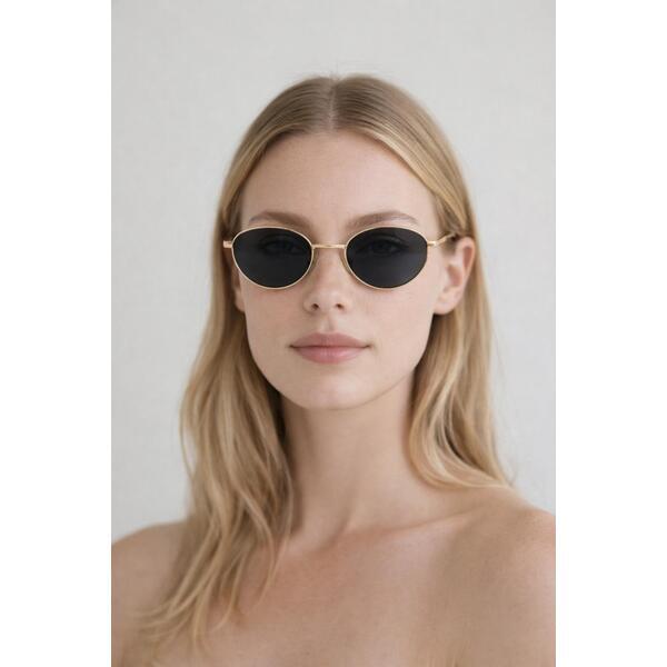 SVNX cat eye sunglasses in black with gold frame, UK version