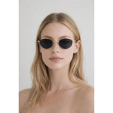 SVNX cat eye sunglasses in black with gold frame, UK version