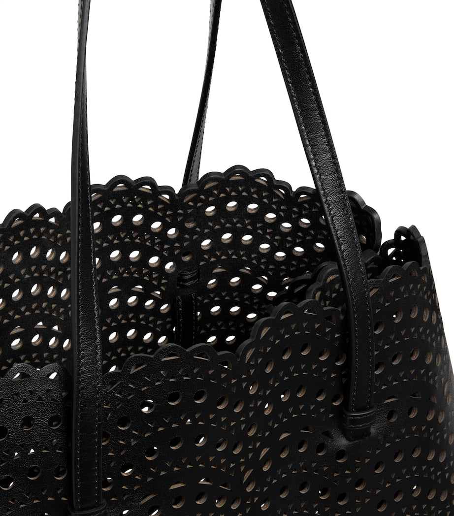Alaïa Mina Vienne top handle bag in leather, imported from the UK