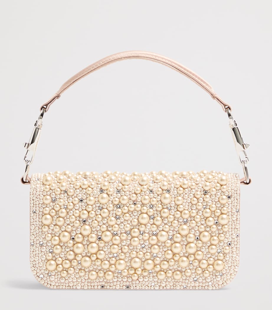 Valentino Garavani small embellished Locò shoulder bag, imported from the UK