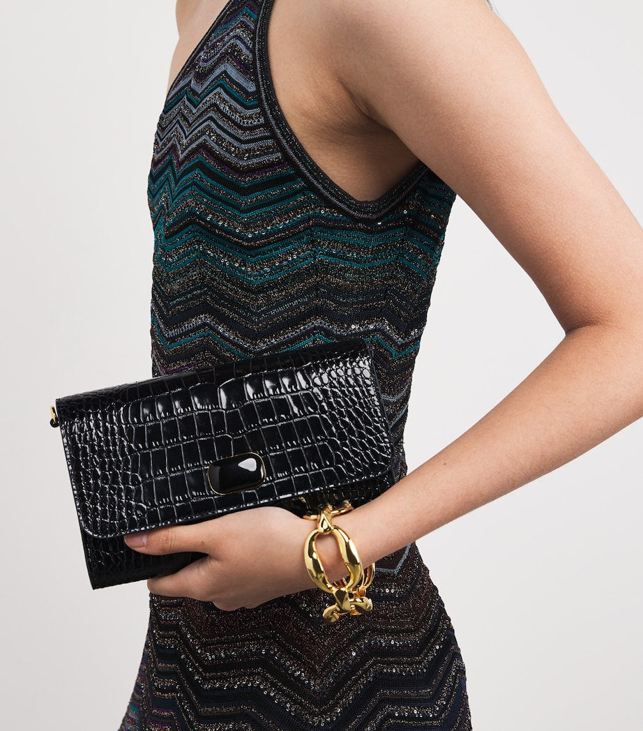 Jeffrey Levinson croc-embossed leather clutch bag, UK version