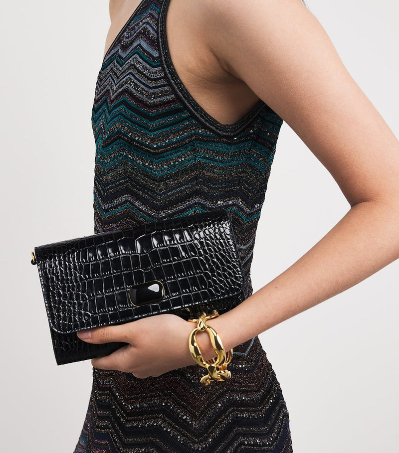 Jeffrey Levinson croc-embossed leather clutch bag, UK version