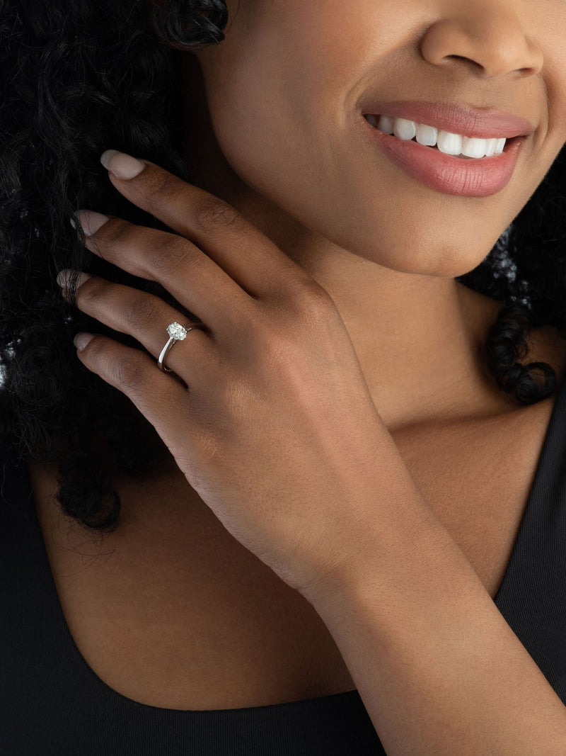 18ct white gold diamond oval shaped halo ring (British brand)