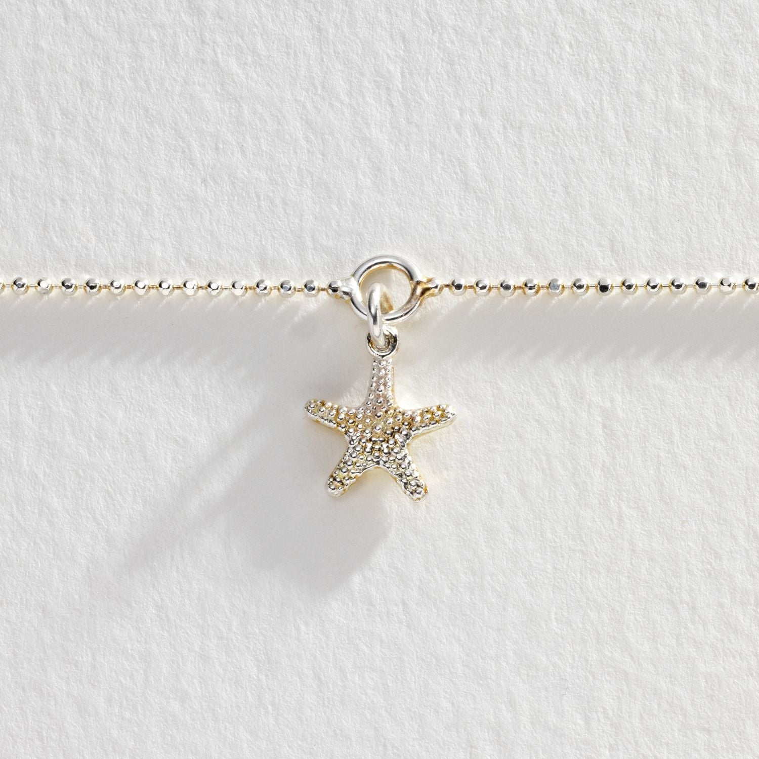 Revere sterling silver anklet with sea star charm, imported from the UK