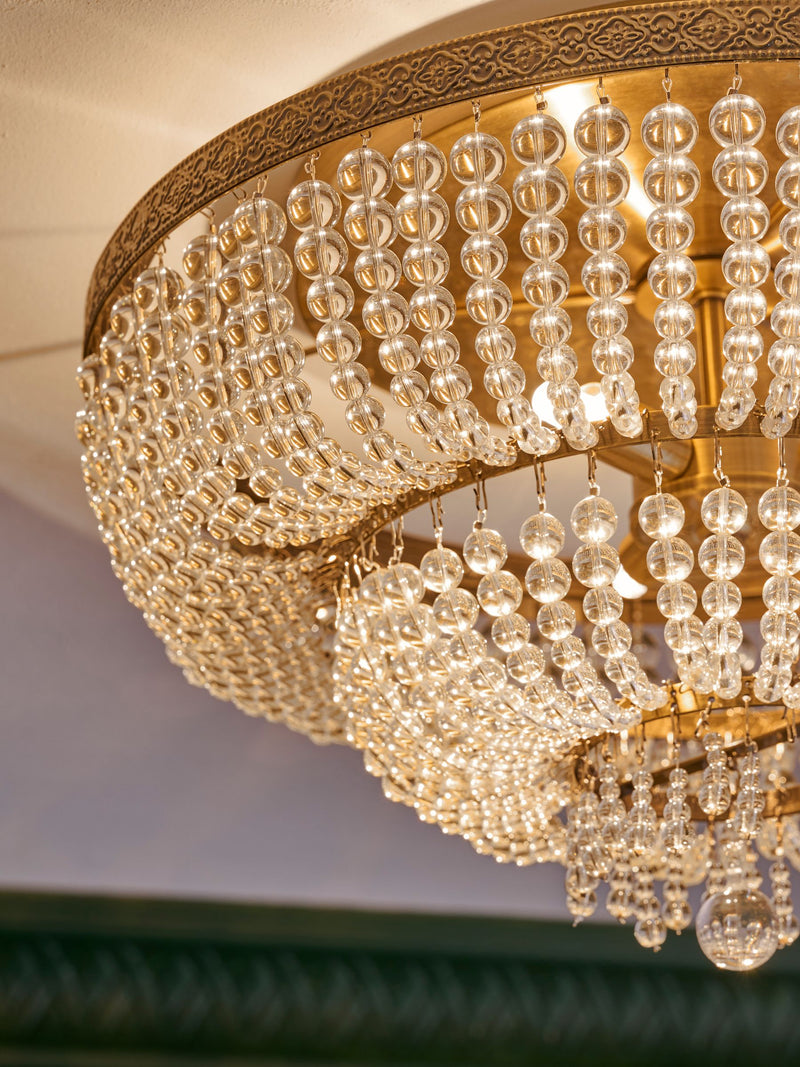 Brass Bamburgh ceiling light with glass beads, imported from the UK
