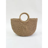 Round woven straw holdall with circular handle (British brand)
