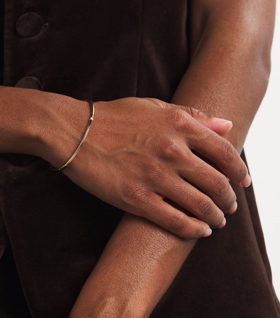 Persée small yellow gold diamond Zeus bangle, imported from the UK