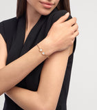 Bvlgari rose gold bangle with mother-of-pearl, imported from the UK