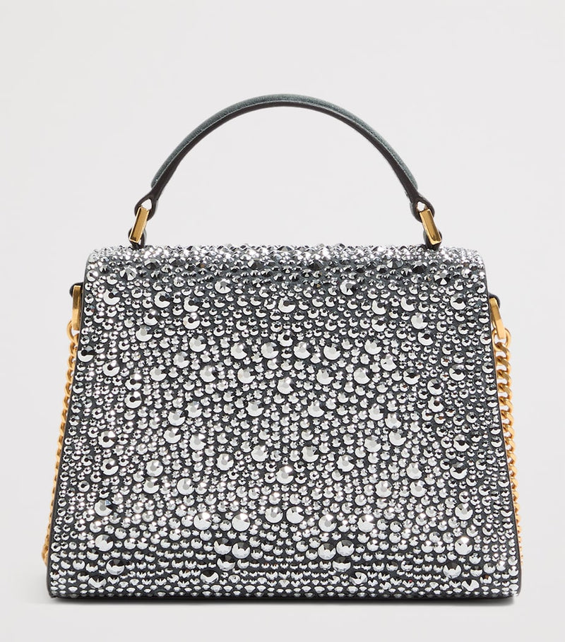 Valentino Garavani mini leather top-handle bag - British product