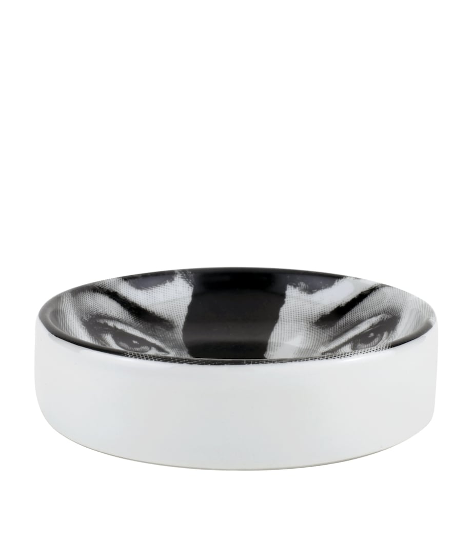 Fornasetti porcelain ashtray with surrealist art design - British product