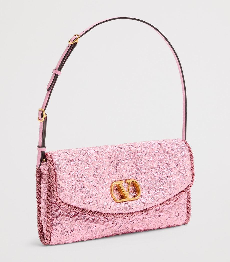 Valentino Garavani Metallic Vain soft shoulder bag, imported from the UK