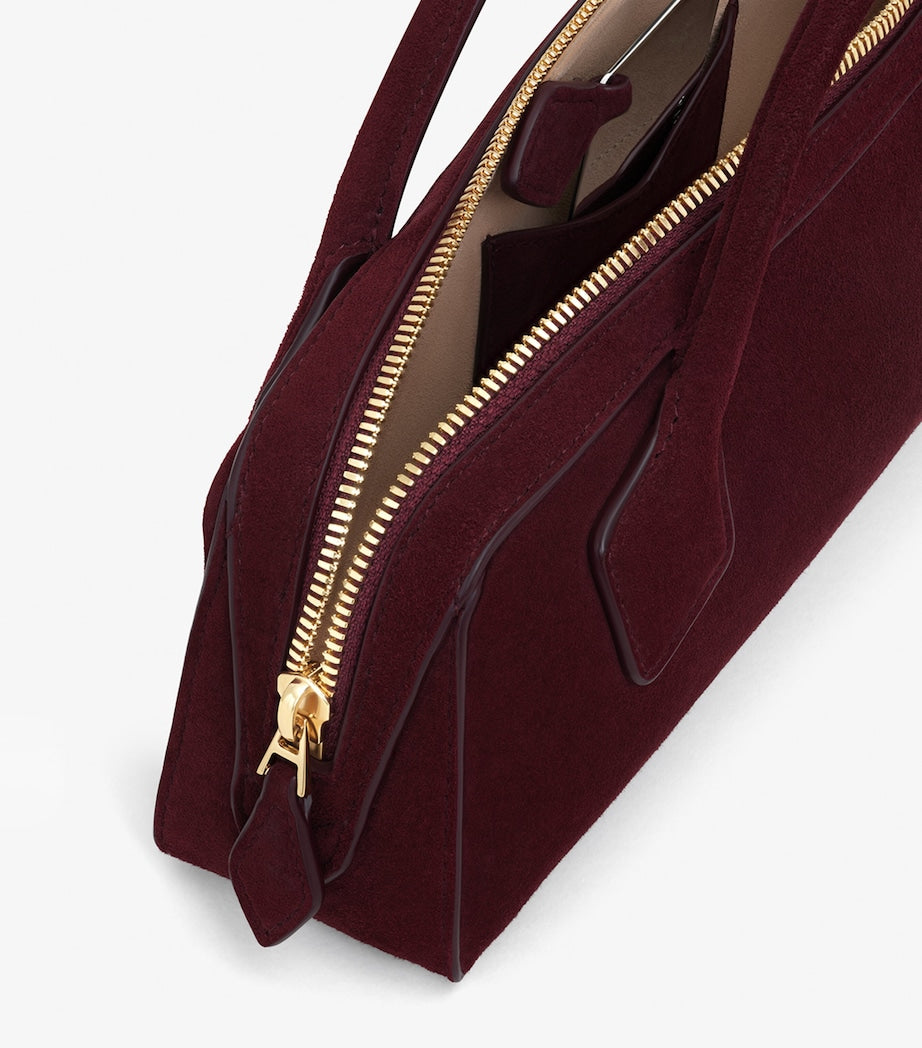 Alaïa Le Teckel suede top-handle bag, imported from the UK