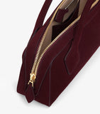 Alaïa Le Teckel suede top-handle bag, imported from the UK