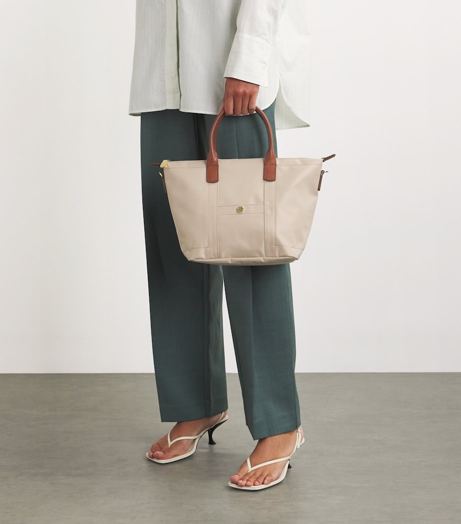 Harrods tote bag made from recycled nylon and leather, imported from the UK