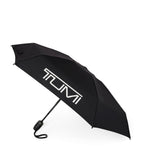 Tumi compact folding umbrella with water-resistant nylon panels (British brand)