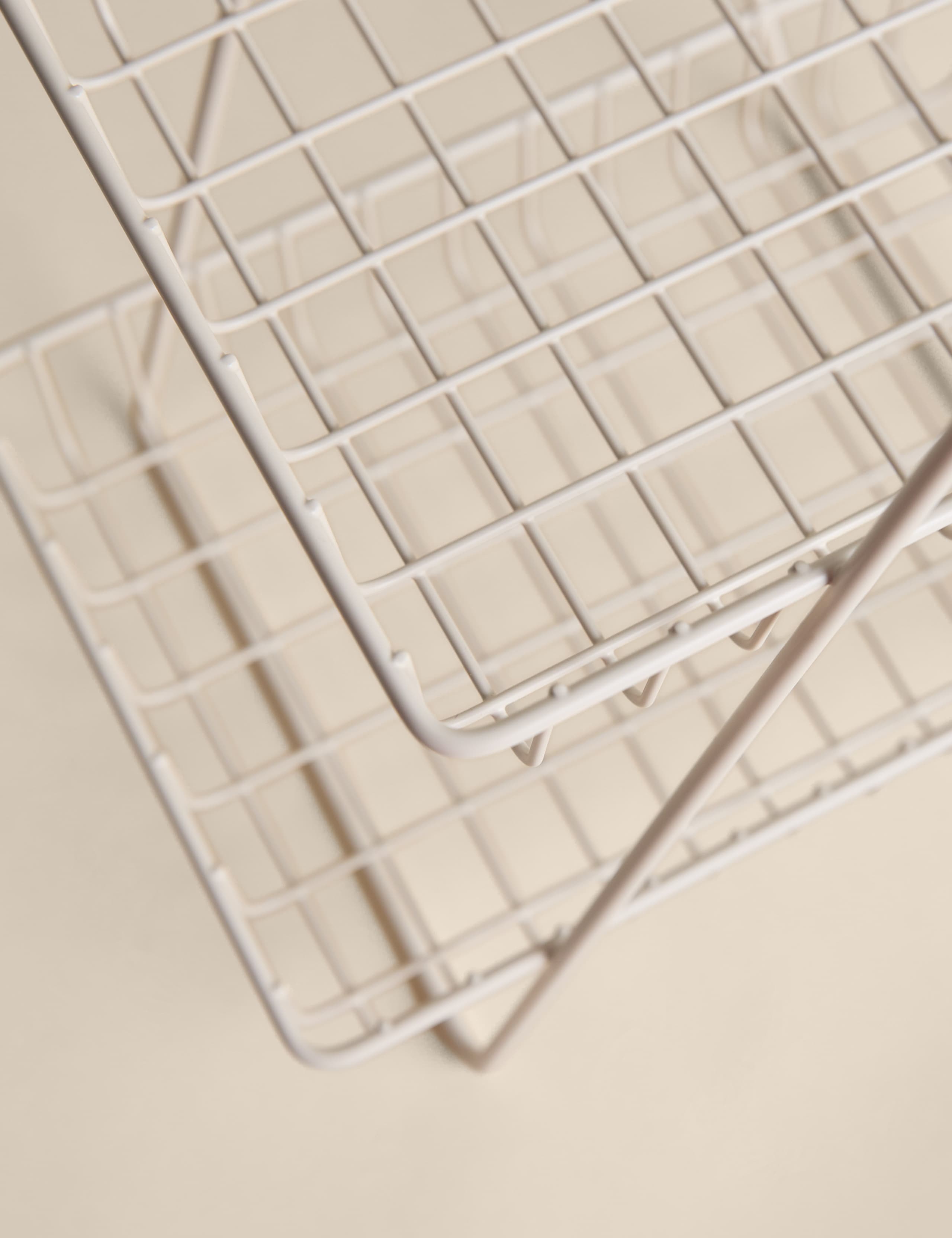 Two-tiered metal wire storage basket for kitchen, imported from the UK