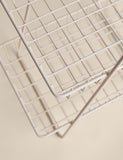 Two-tiered metal wire storage basket for kitchen, imported from the UK