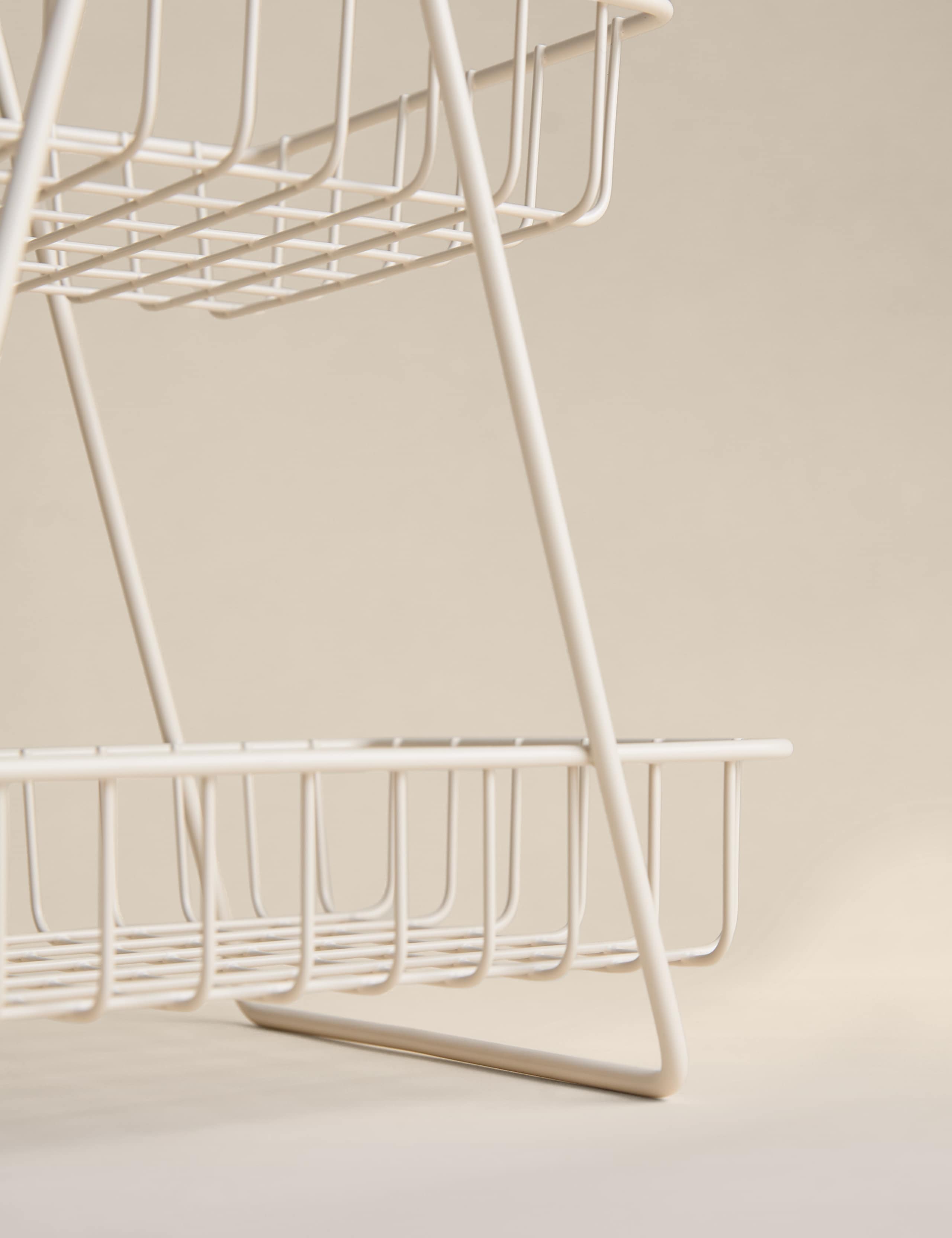 Two-tiered metal wire storage basket for kitchen, imported from the UK