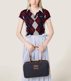 Miu Miu Beau denim top-handle bag with calf leather trims (British brand)