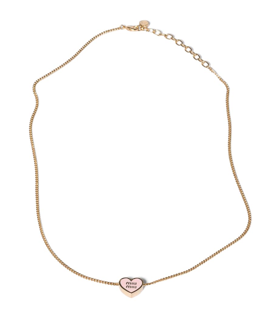Miu Miu heart pendant necklace with enamel trim, imported from the UK