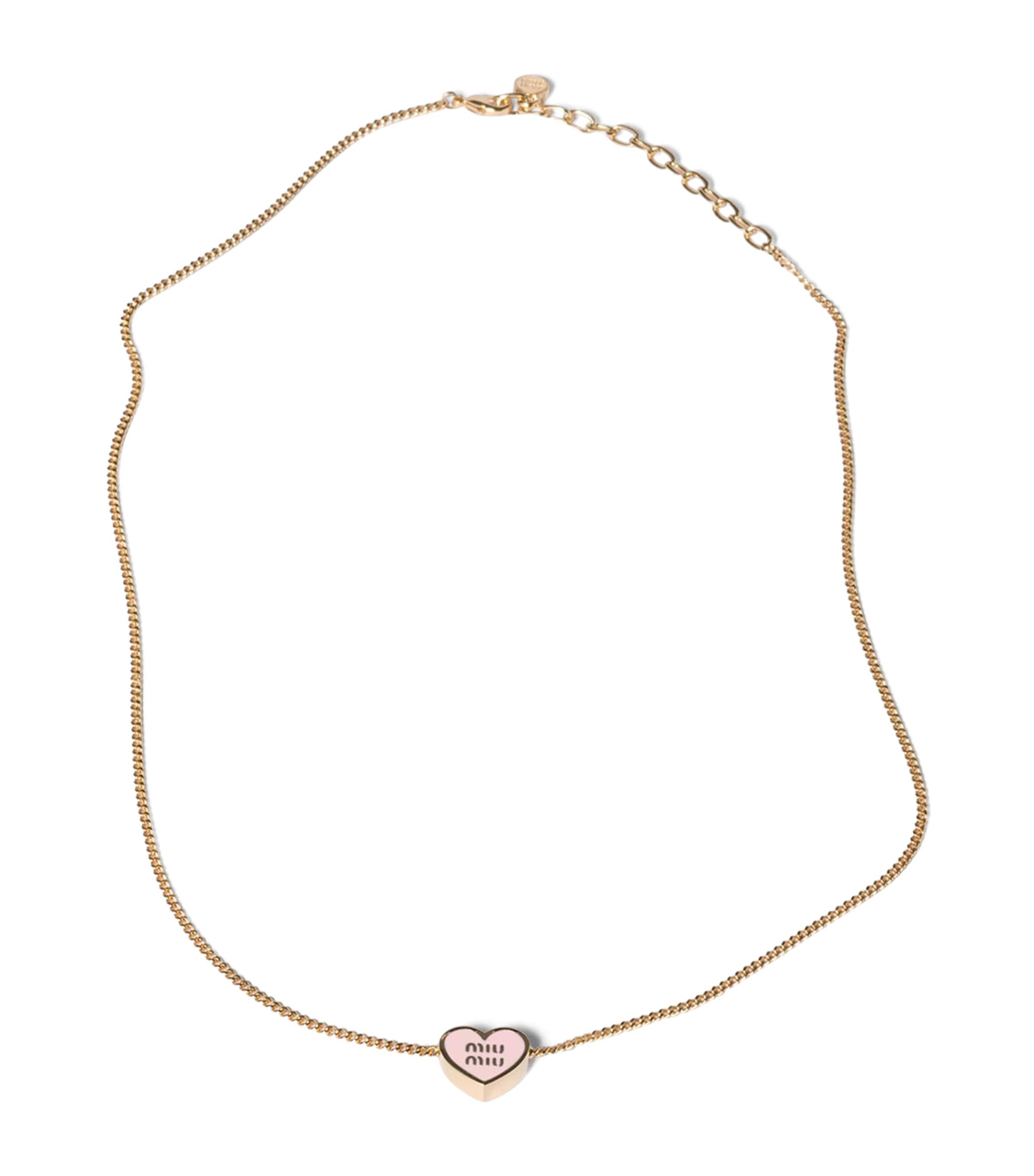 Miu Miu heart pendant necklace with enamel trim, imported from the UK