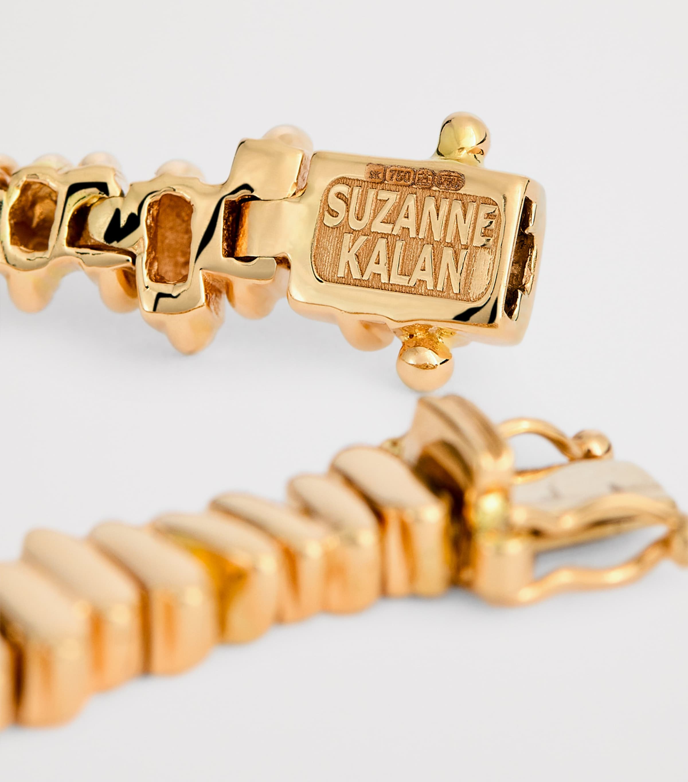 Suzanne Kalan rose gold golden tennis bracelet, imported from the UK