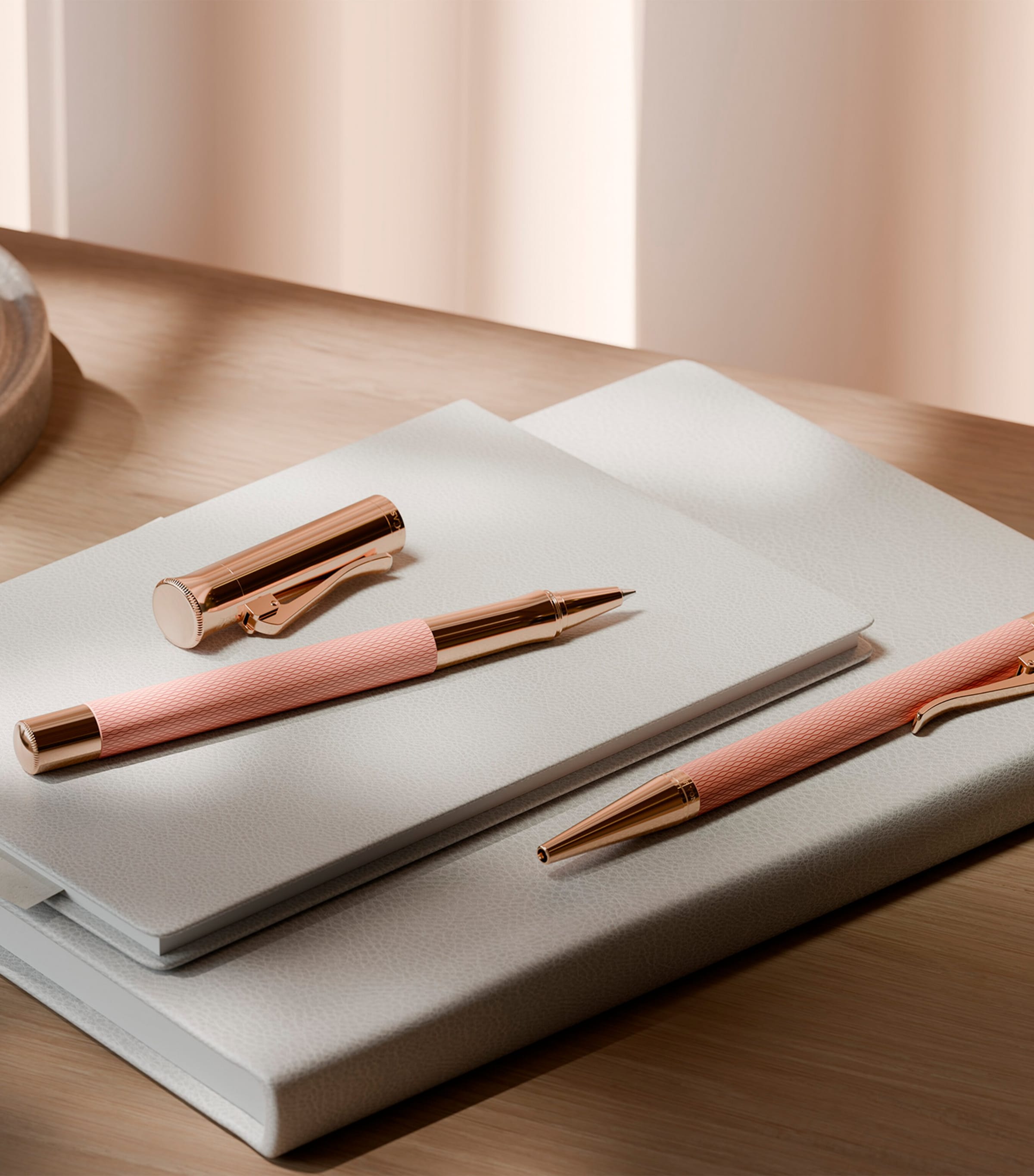Graf von Faber-Castell rose gold propelling ballpoint pen with precious resin barrel, 13cm length, UK version