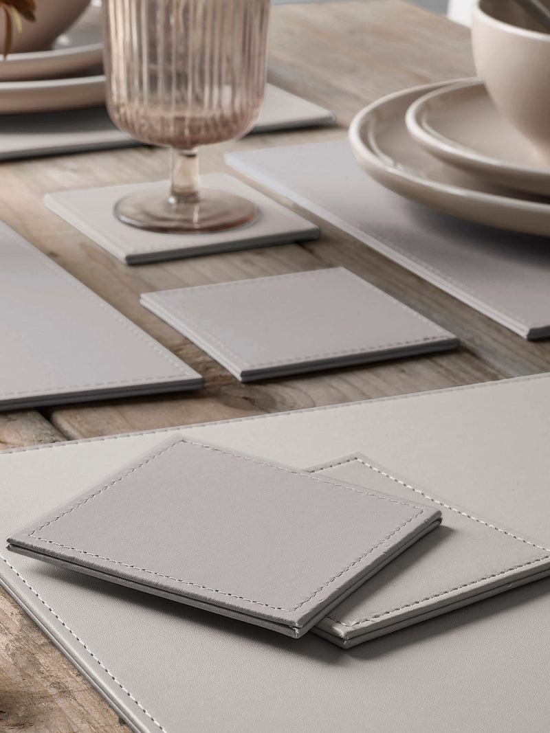 Set of 4 natural reversible faux leather placemats and coasters (British brand)