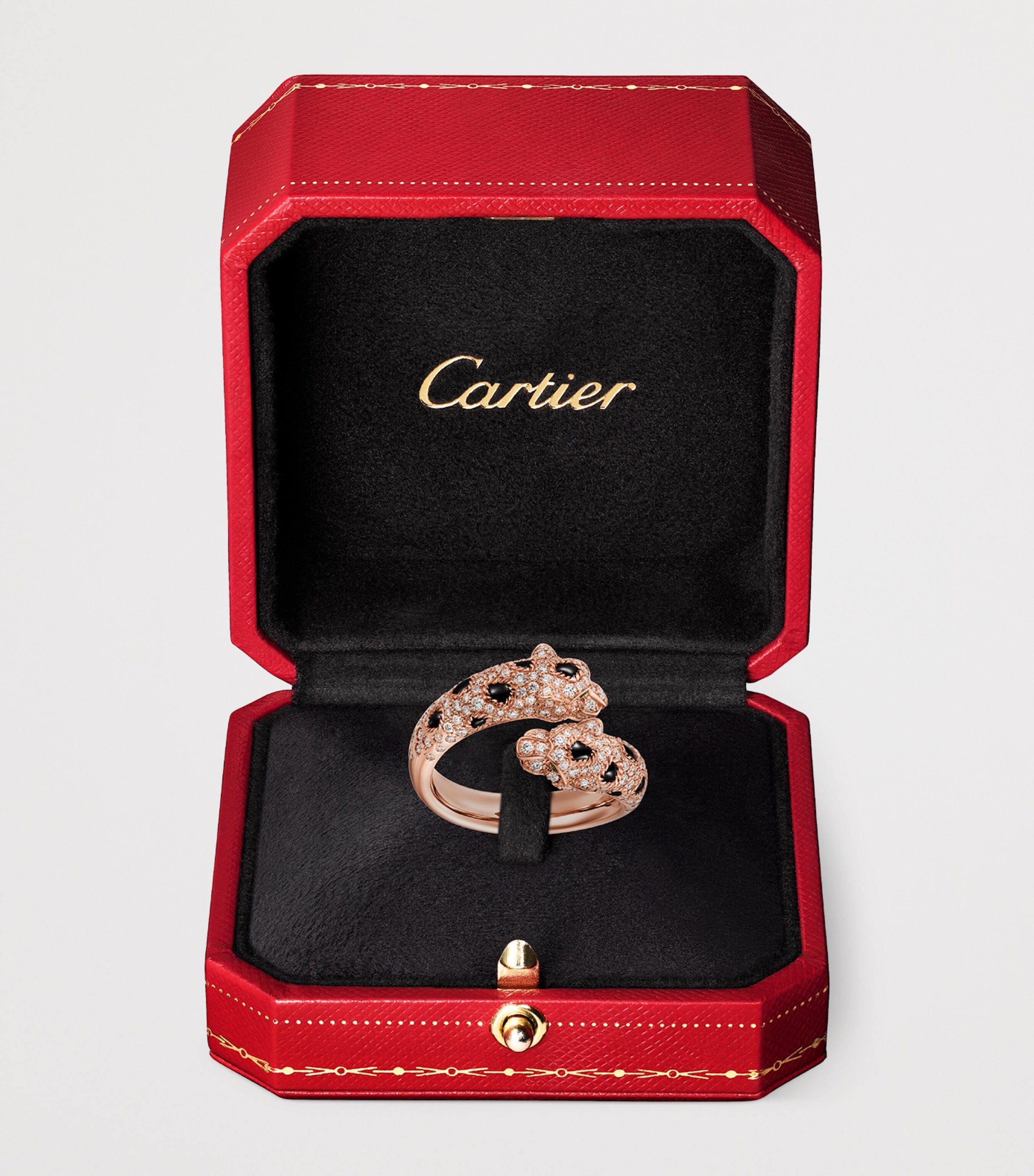 Cartier rose gold Panthère ring with diamonds, emerald, and onyx - British product