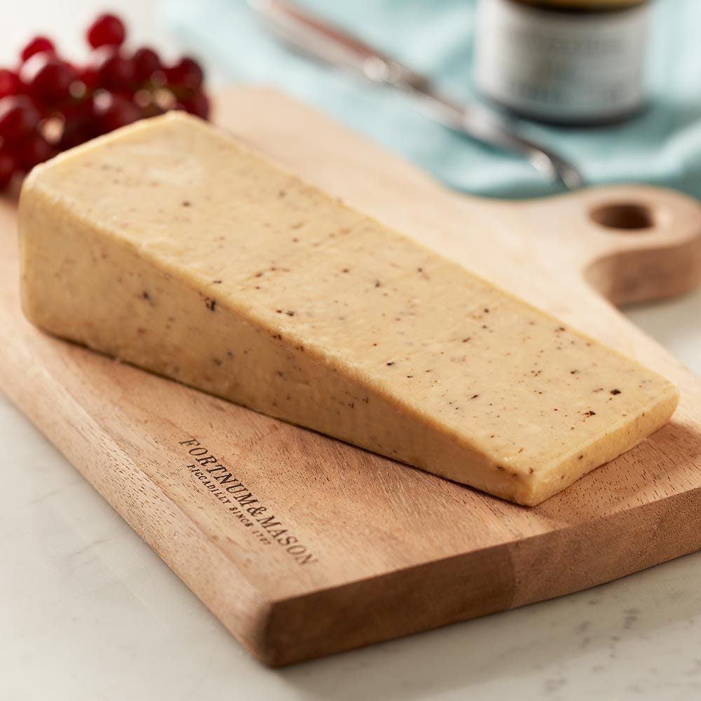 Smooth truffled cheddar cheese wedge 400g, UK version