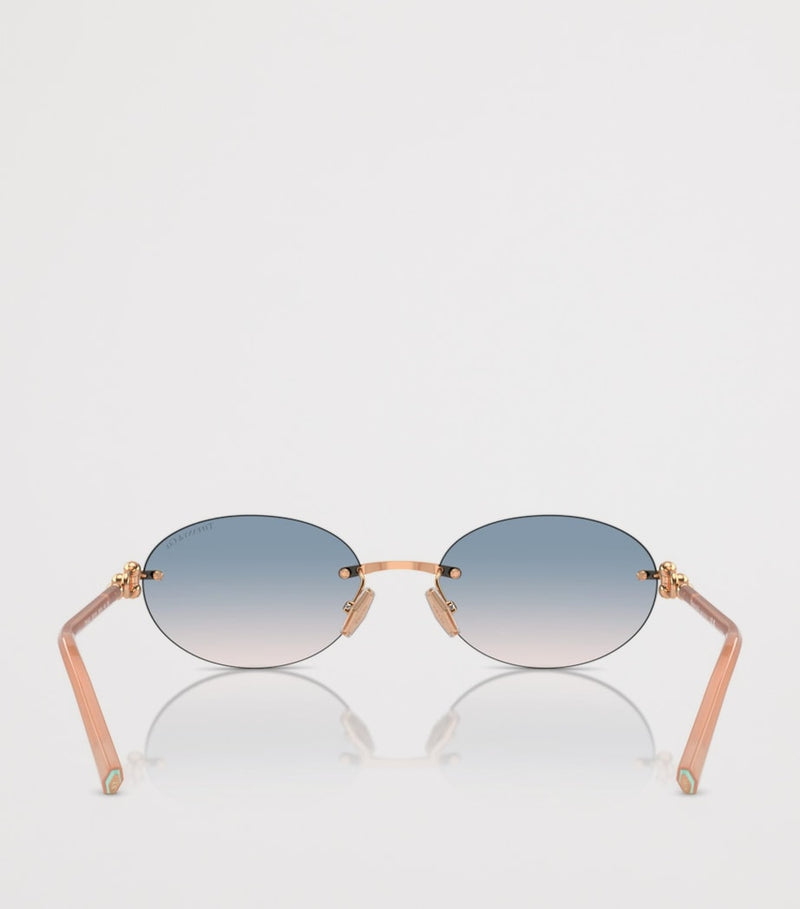 Tiffany & Co. rimless oval sunglasses with gold-tone temples, UK version