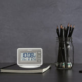 Seiko LCD alarm clock with calendar and temperature display (British brand)