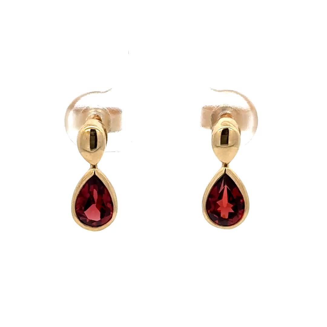 E.W Adams garnet pear drop earrings 9ct yellow gold, UK version