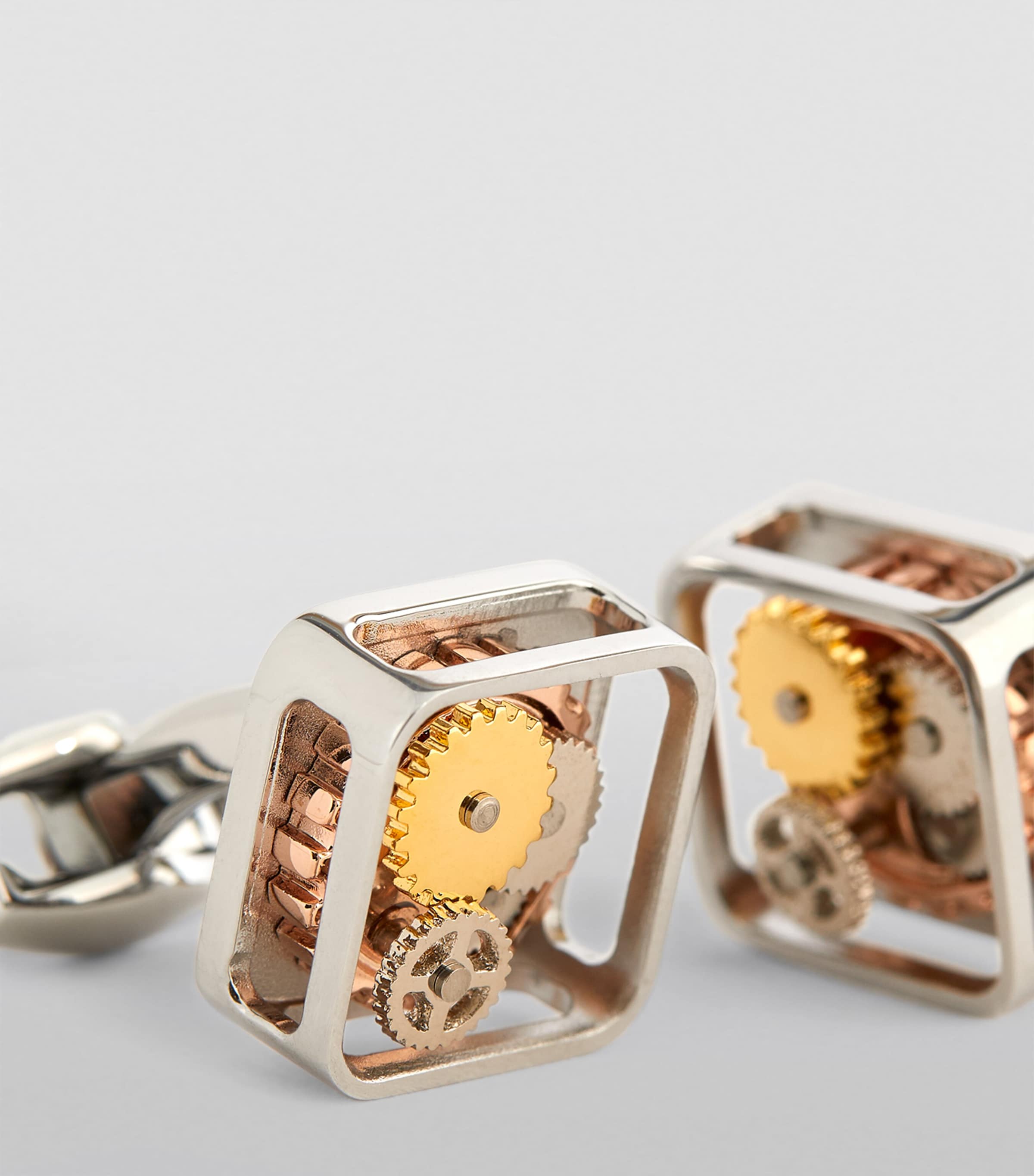 Tateossian cufflinks with square gear design, imported from the UK