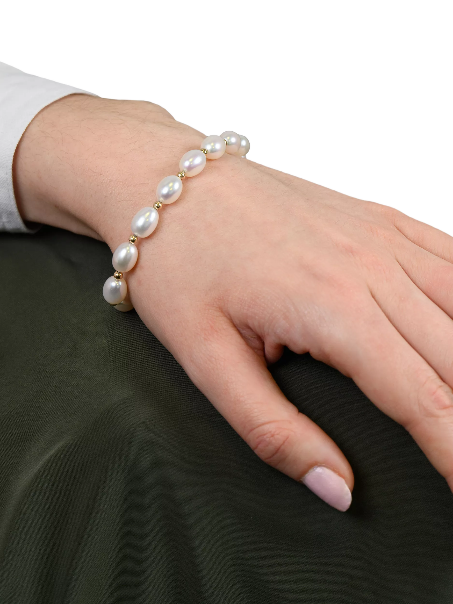 E.W Adams oval freshwater pearl bracelet with 9ct gold, imported from the UK