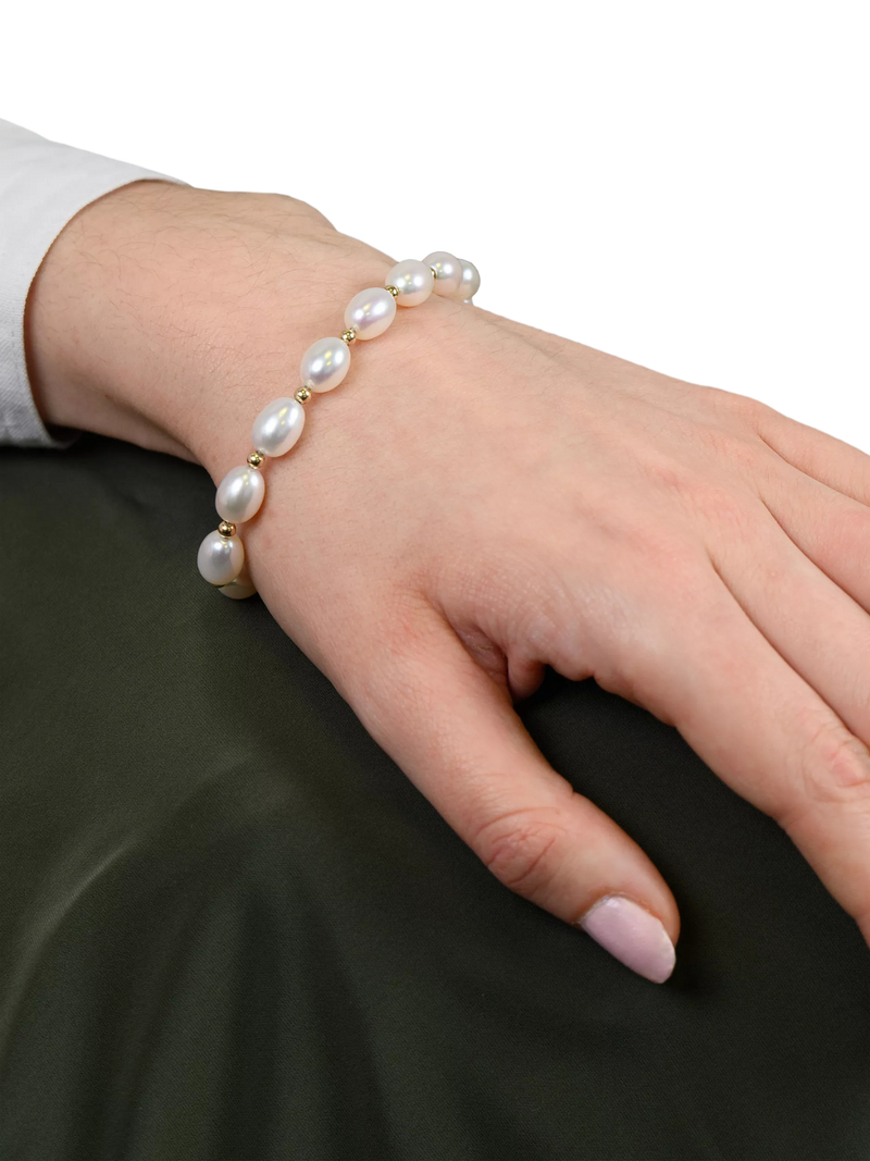 E.W Adams oval freshwater pearl bracelet with 9ct gold, imported from the UK