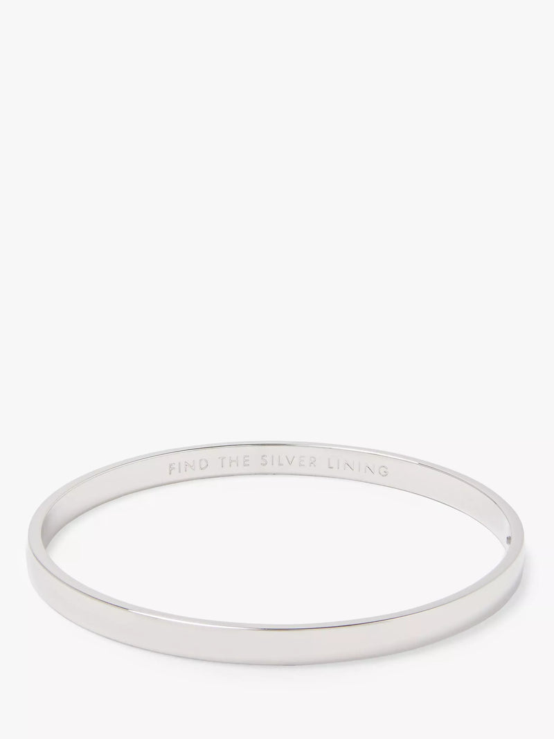 kate spade new york silver bangle with 'Find the Silver Lining' inscription, UK version