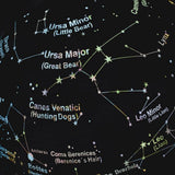 Illuminated Earth and constellations globe showing world map and stars - British product