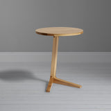 Case Cross round side table in solid oak finish, UK version