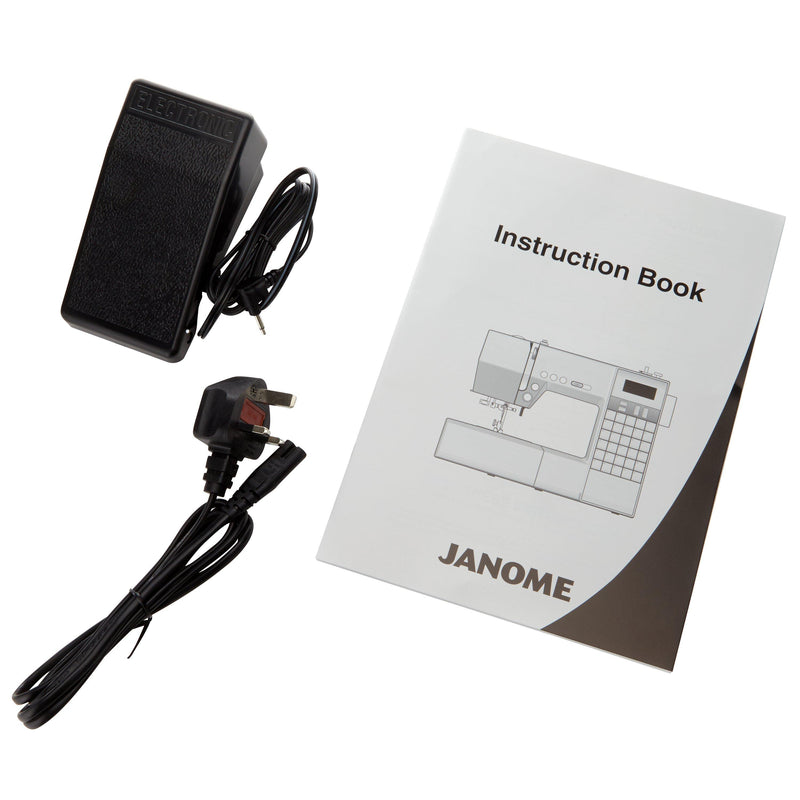 Janome DC6030 computerised sewing machine with accessories, UK version