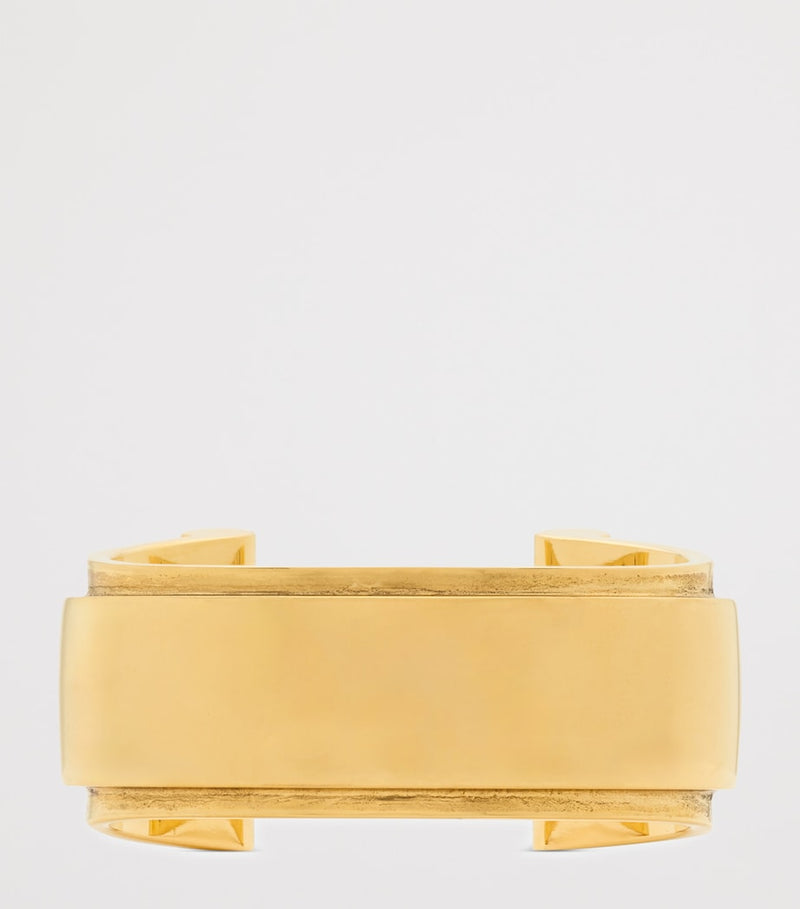 Saint Laurent Scroll Open Cuff Bracelet brass, imported from the UK