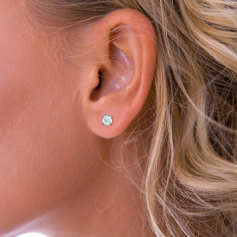 Nina B small claw set cubic zirconia stud earrings, UK version
