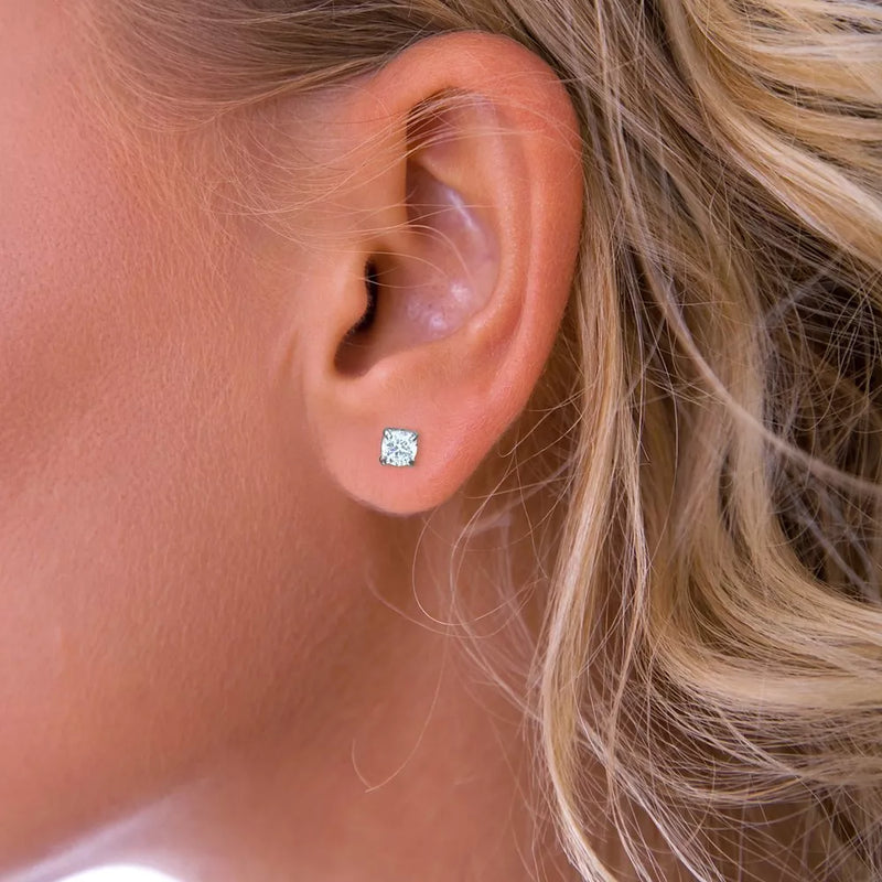 Nina B small claw set cubic zirconia stud earrings, UK version