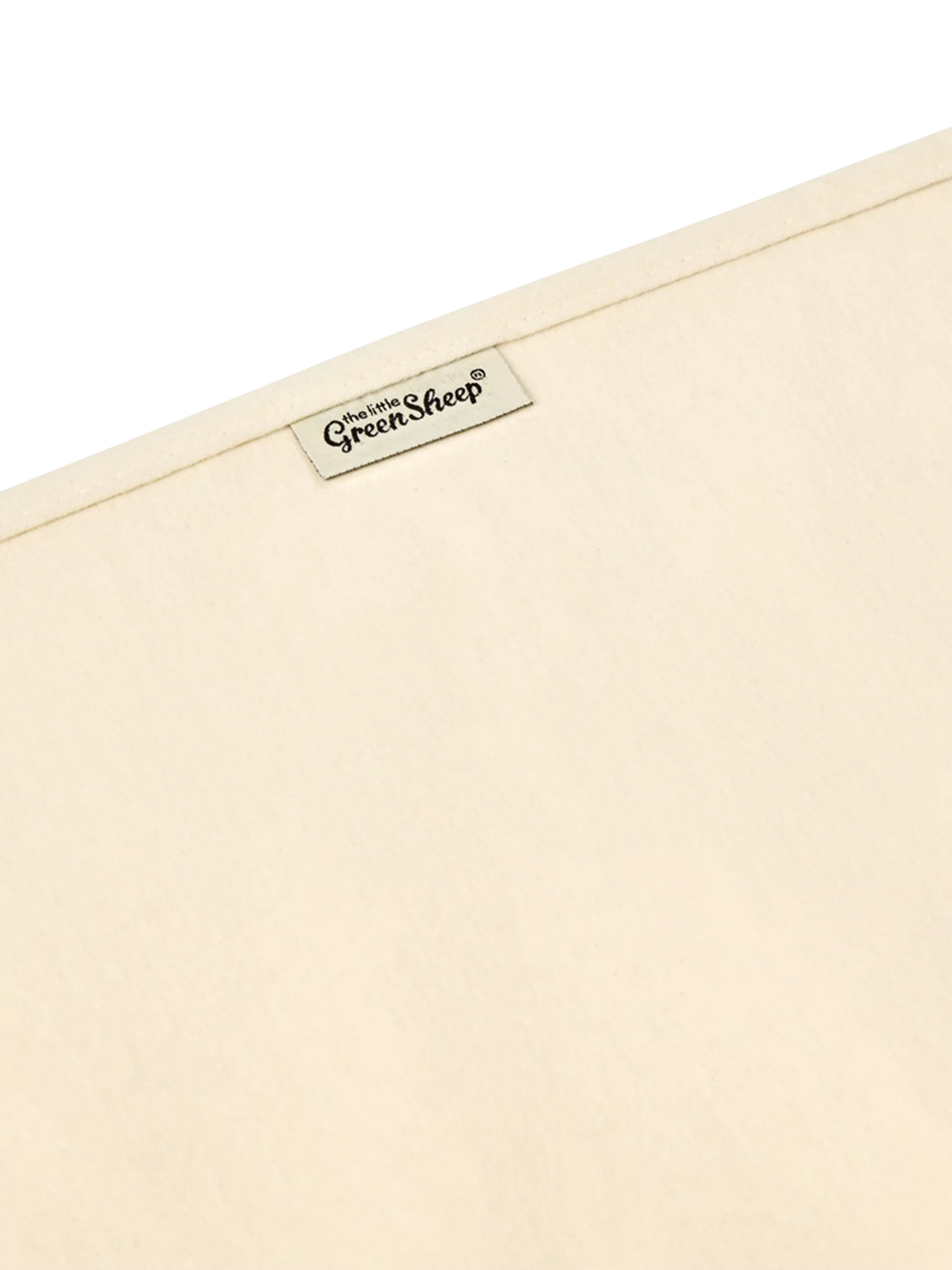 The Little Green Sheep waterproof cot mattress protector (British brand)