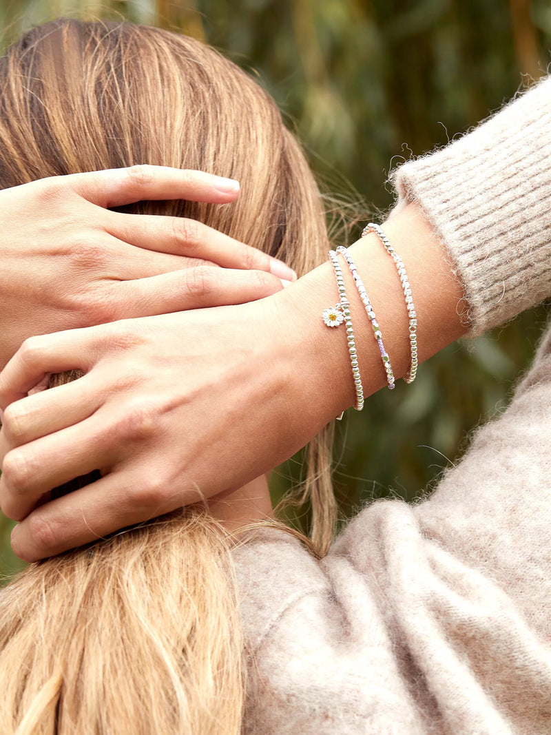 Estella Bartlett Sienna Flower Charm Stretch Bracelet in Silver - British product