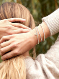 Estella Bartlett Sienna Flower Charm Stretch Bracelet in Silver - British product