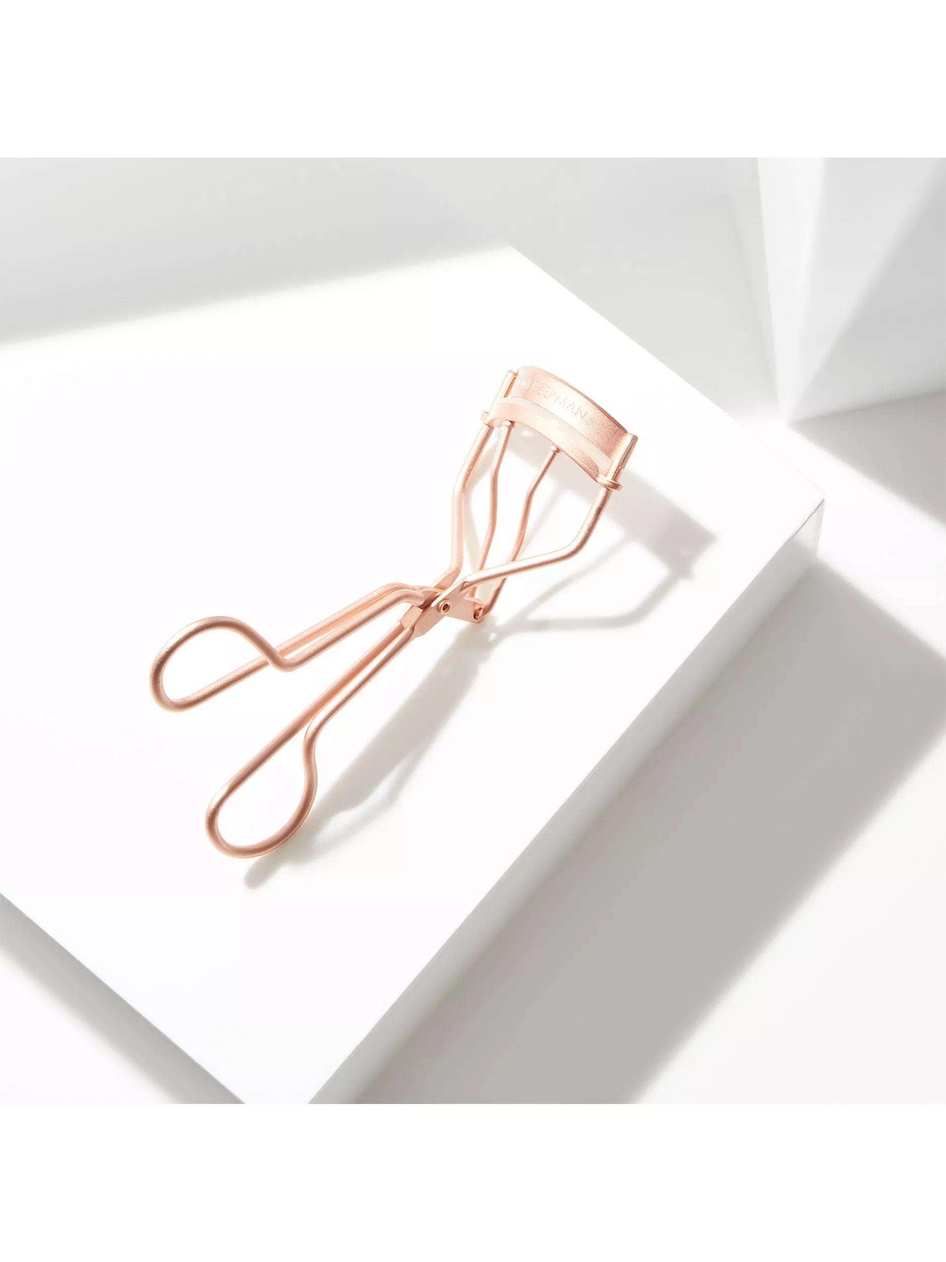 Tweezerman rose gold eyelash curler, imported from the UK